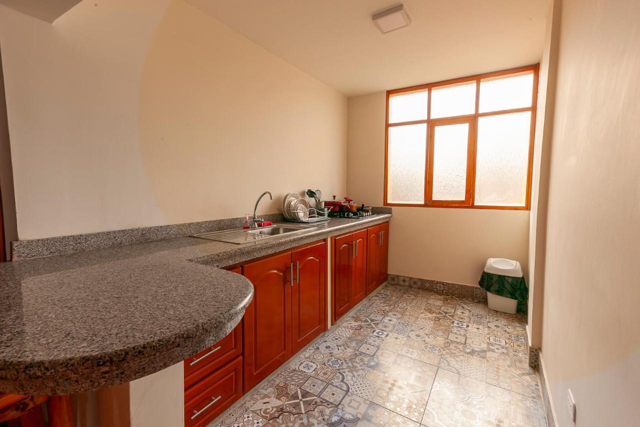 Los Ponchos Inn Apartasuite Otavalo Buitenkant foto
