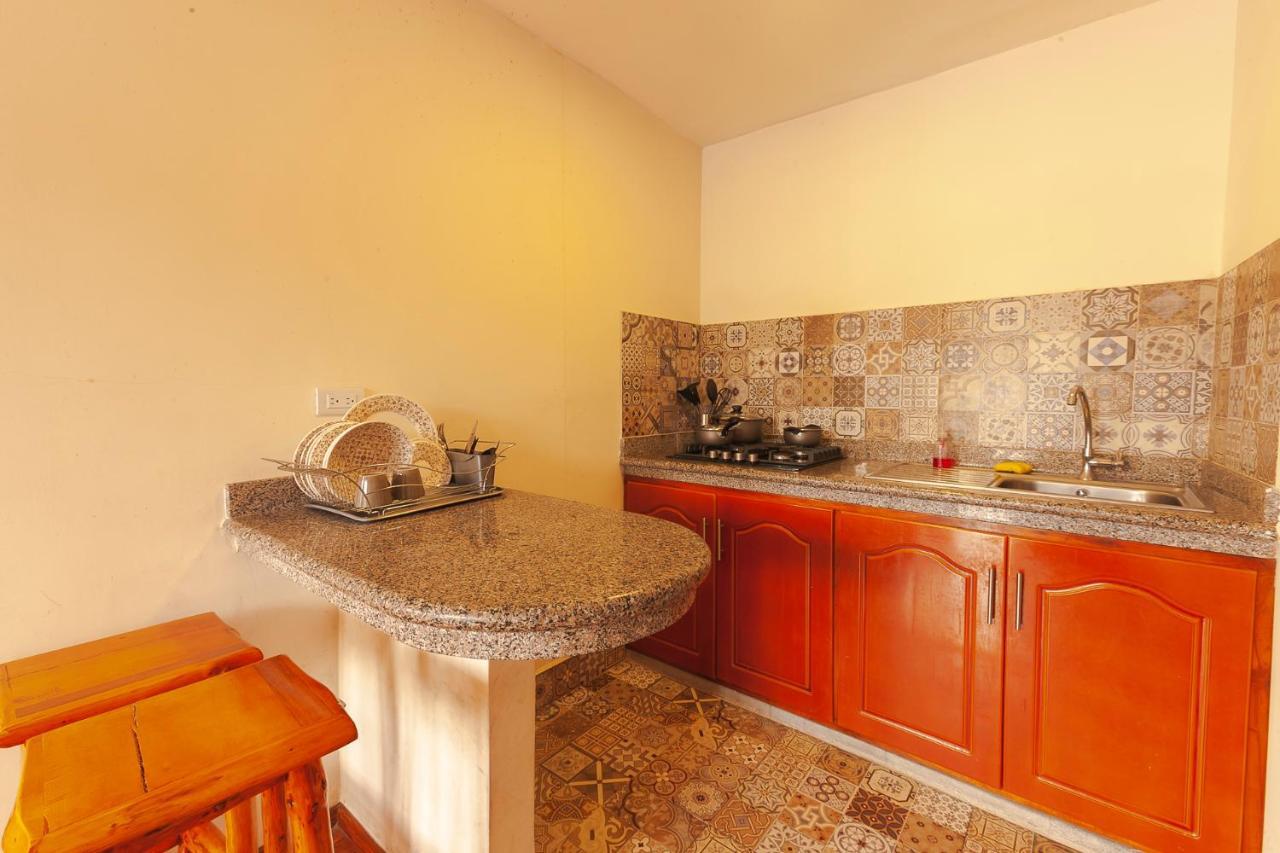 Los Ponchos Inn Apartasuite Otavalo Buitenkant foto
